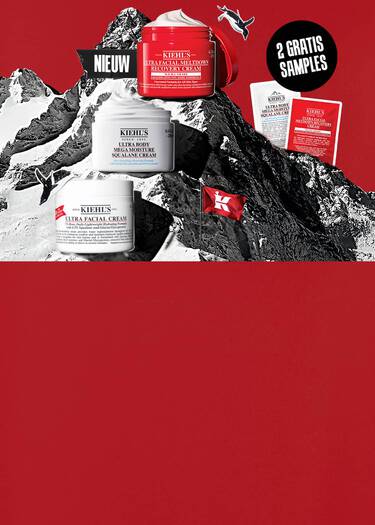 Kiehl's banner met de Ultra Facial-collectie op een besneeuwde bergtop. Je ziet de Ultra Facial Cream, Meltdown Recovery Cream en Mega Moisture Squalane bodycreme, met de tekst '2 gratis samples bij je bestelling'.