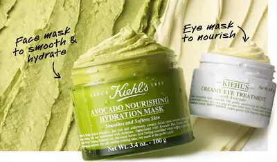Close-up of two skincare products: a green jar labeled "Avocado Nourishing Hydration Mask" for smoothing and hydrating the skin, and a white jar labeled "Creamy Eye Treatment" for nourishing the eye area, set against a textured green backdrop.
