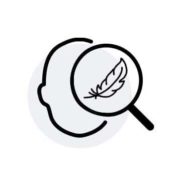 A simple line drawing of a head silhouette with a magnifying glass focused on a feather.