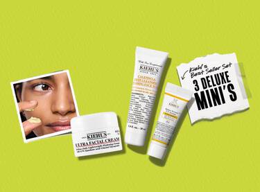 Een liggende promotionele banner van Kiehl's tegen een effen limoengroene achtergrond met een lichte textuur, waarop aan de linkerkant een vierkante Polaroid-foto te zien is van een persoon die een lichtgele creme onder het oog aanbrengt. In het midden van de banner liggen drie luxe productminiaturen op een rij, bestaande uit een heel kleine witte Ultra Facial Cream, een grotere witte tube Calendula Deep Cleansing Foaming Face Wash en een kleine witte tube met een geel vlak voor de Better Screen UV Serum Sunscreen SPF 50+. Aan de rechterkant bevindt zich een gescheurd wit papiertje, vastgeplakt met transparant plakband, met de handgeschreven tekst "Kiehl's Best Seller Set" en een pijltje dat wijst naar de grote, dikgedrukte zwarte tekst "3 DELUXE MINI'S".