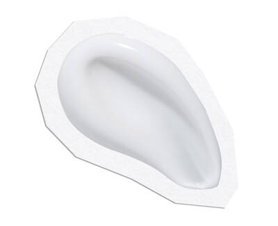 A smooth, glossy white object shaped like an ear, positioned on a white background.