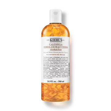 Een fles van 250 ml Kiehl's Calendula Herbal-Extract Toner met een heldere vloeistof en gouden tint.