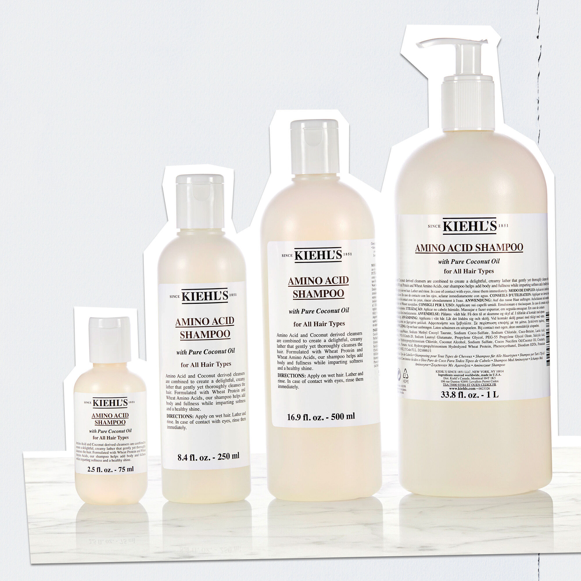 Assortiment Kiehl's Amino Acid Shampoo-flessen in verschillende maten
