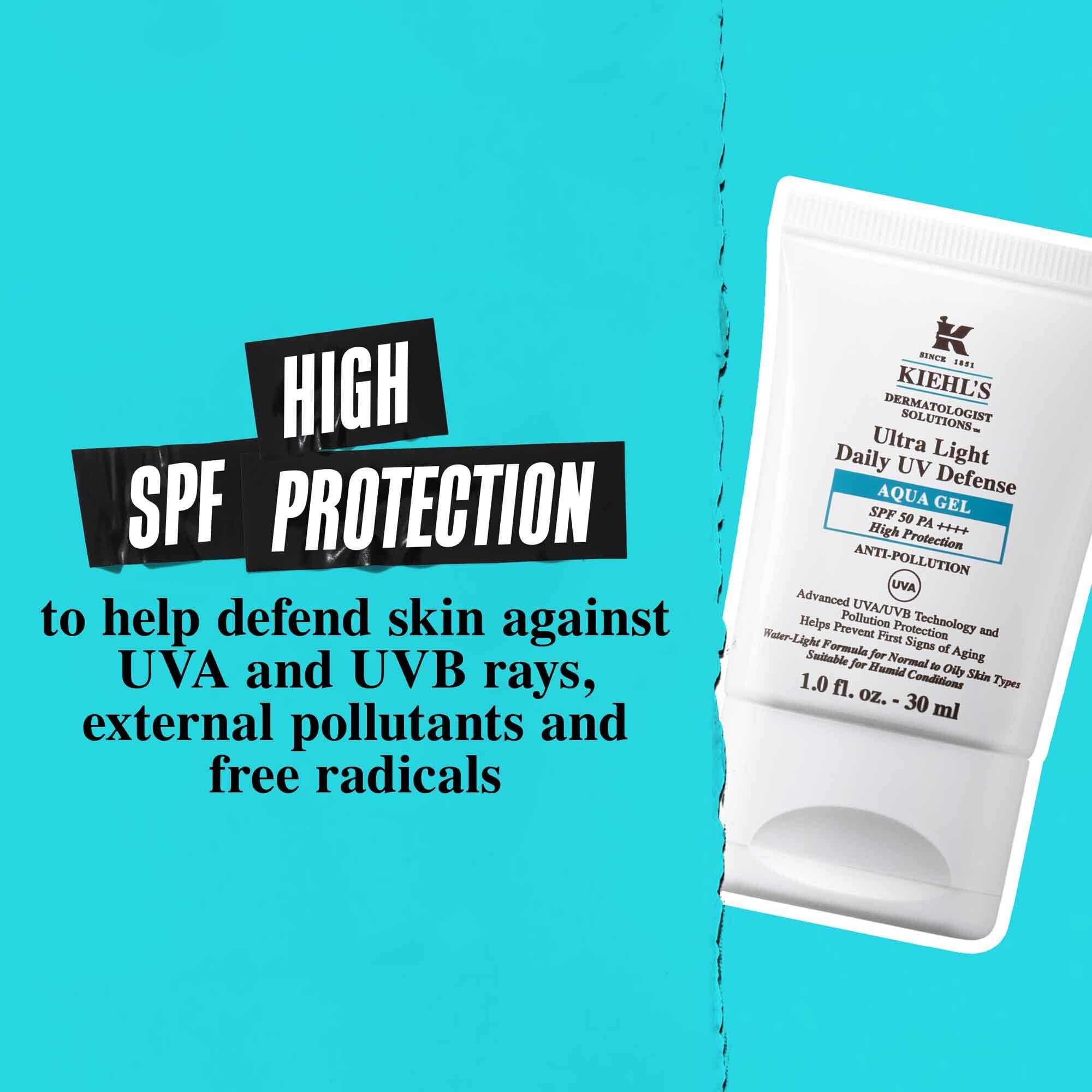 Een tube Ultra Light Daily UV Defense Aqua Gel tegen een blauwe achtergrond met de tekst: "Hoge SPF-bescherming om de huid te helpen verdedigen tegen UVA- en UVB-stralen, externe verontreinigende stoffen en vrije radicalen."