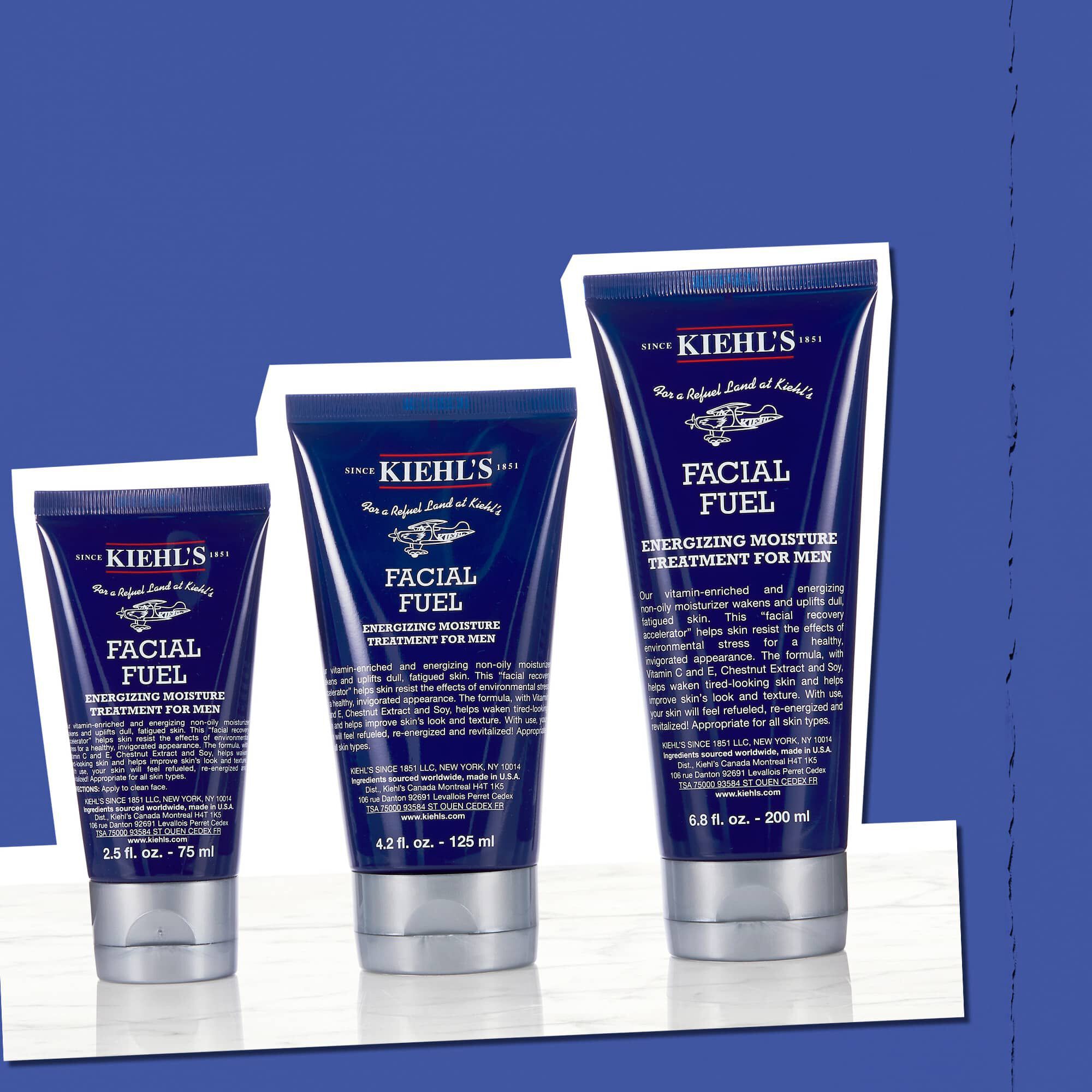 Drie flessen Facial Fuel Energizing Moisture Treatment voor mannen ter illustratie van de beschikbare formaten