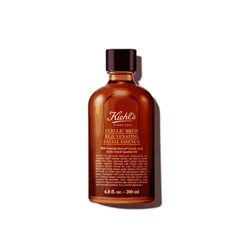 A graphic featuring a dark amber bottle of Kiehl's Ferulic Brew Facial Essence with a black cap. The label has white and yellow text that reads “200 ml". 