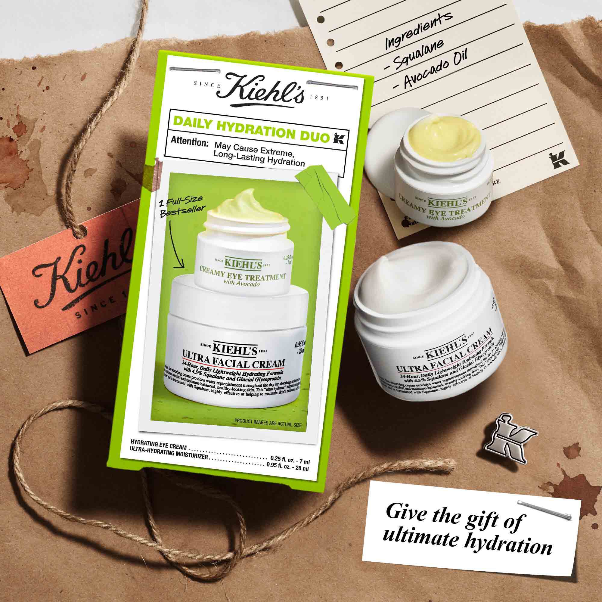 Daily Hydration Duo box with both products placed on brown paper, surrounded by lifestyle elements.