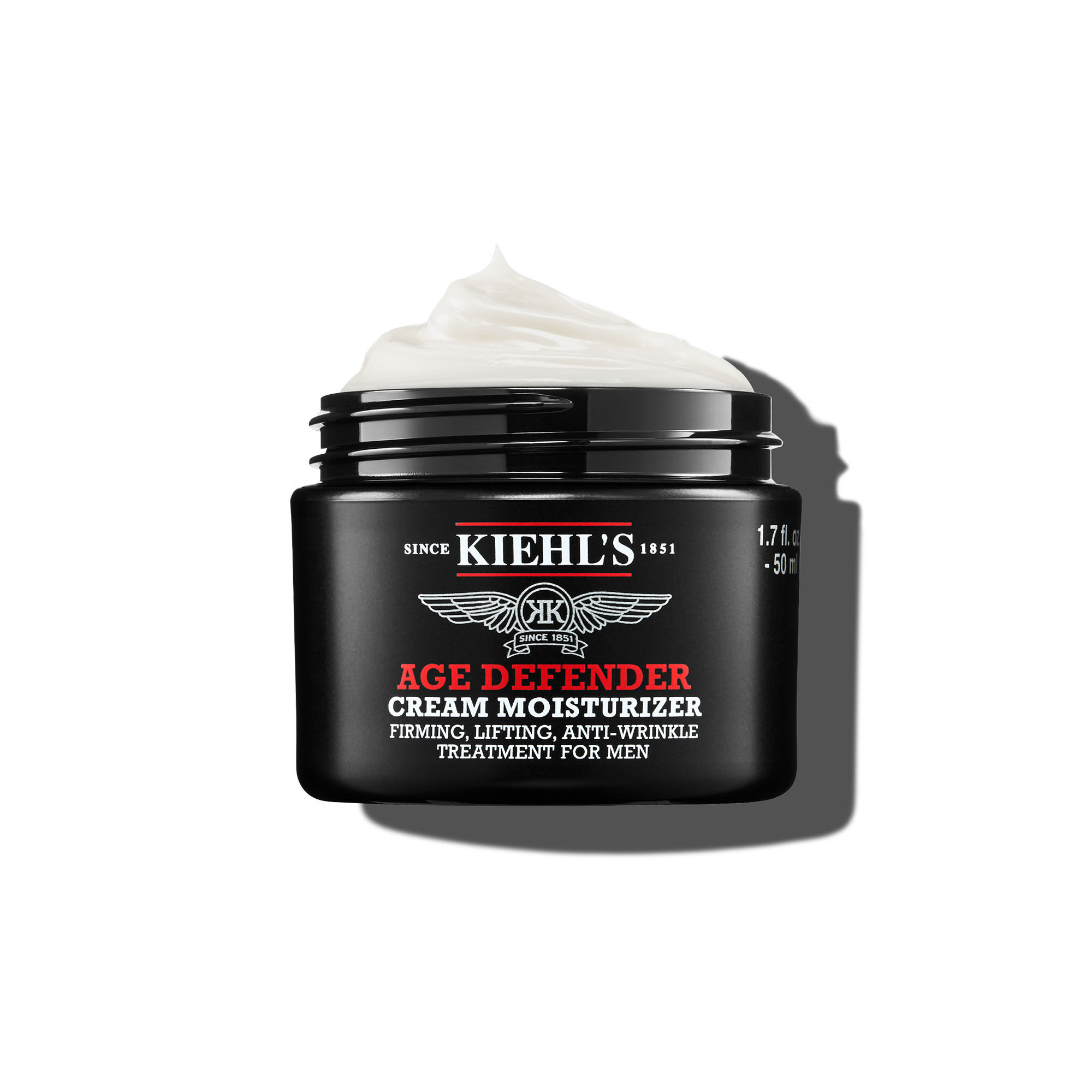 Een pot van 50 ml Kiehl's Age Defender Cream Moisturizer met een opgeklopte textuur tegen een witte achtergrond.