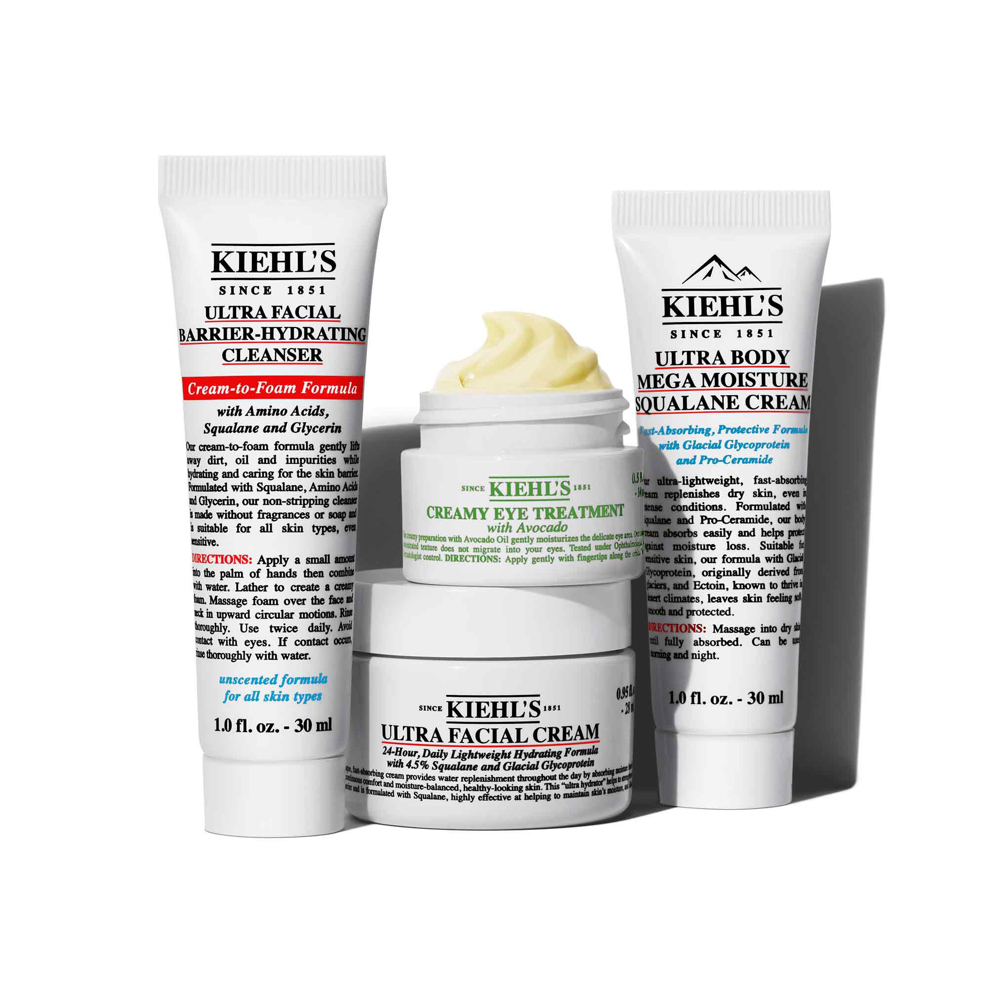 Kiehl's huidverzorgingsproducten: Ultra Facial Cream, Creamy Eye Treatment met Avocado en Ultra Facial Barrier Hydrating Cleanser.