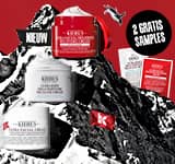 Kiehl's banner met de Ultra Facial-collectie op een besneeuwde bergtop met de tekst 2 gratis samples bij je bestelling.